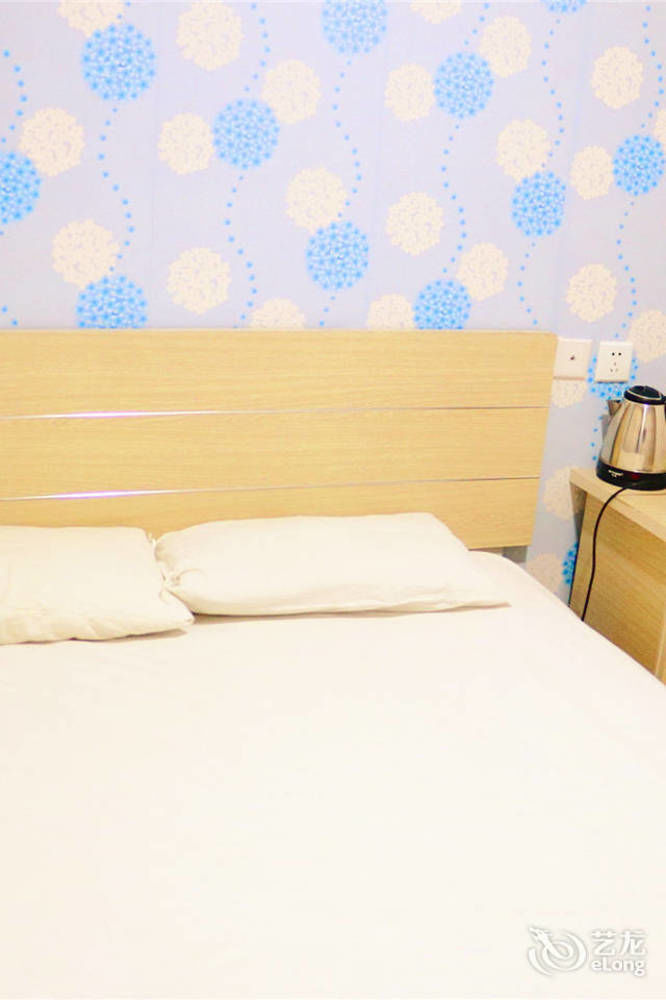 Qingdao Peninsula Four Seasons Business Hotel 外观 照片